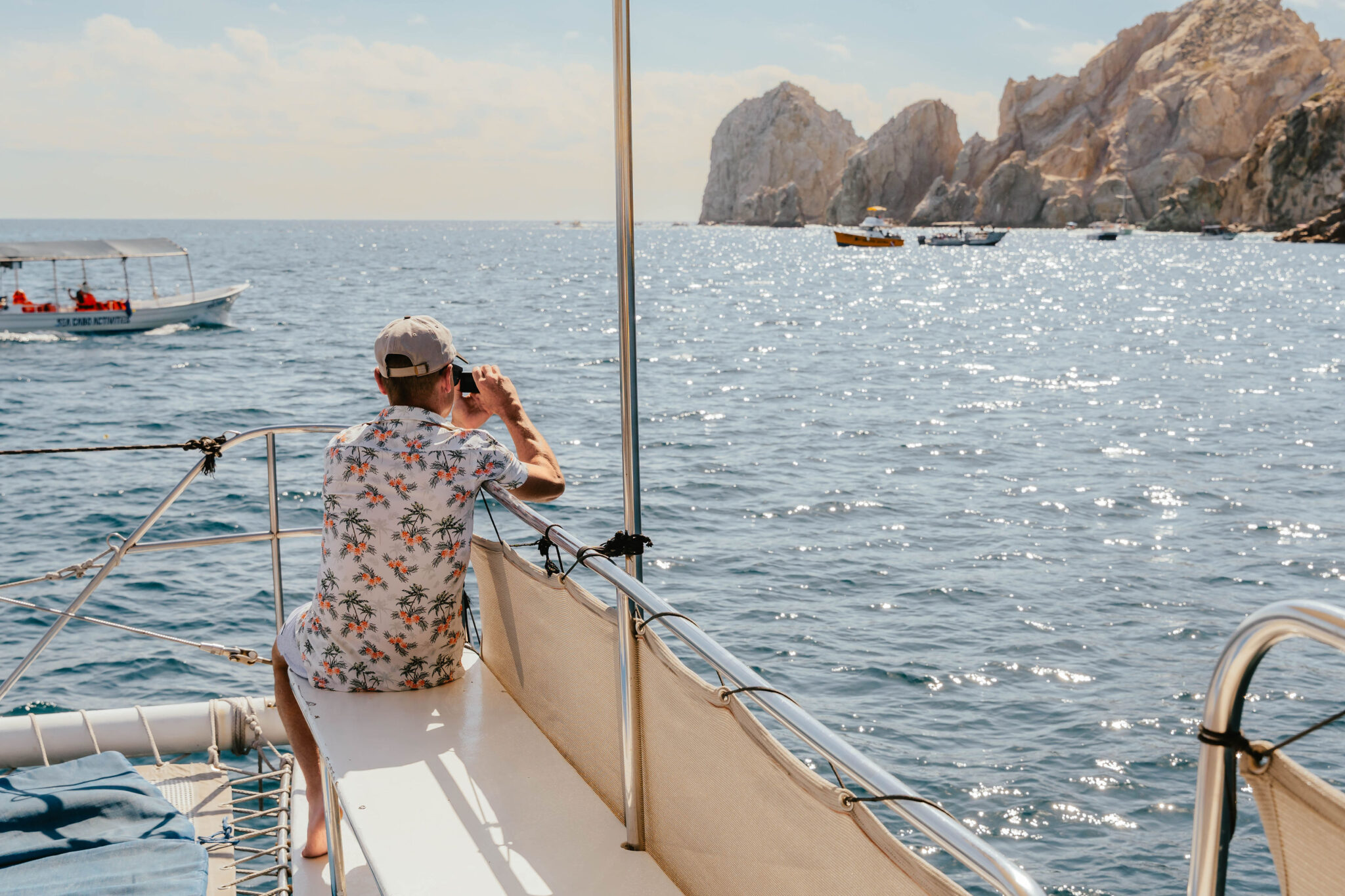 relaxing-on-deck-catamaran-los-cabos.-Private -Snorkeling