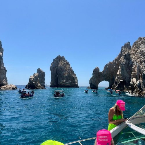 Group cheers on deck – “the perfect Cabo moment-infinity 45