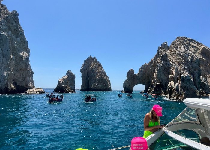 Group cheers on deck – “the perfect Cabo moment-infinity 45