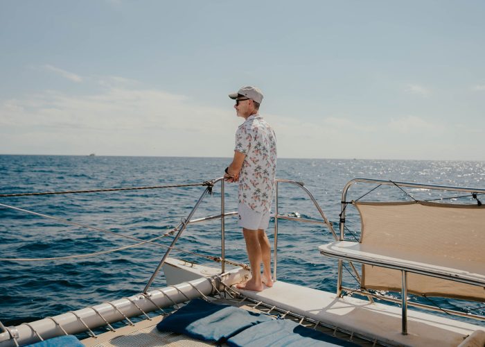 couple-on-catamaran-sunset-los-cabos-Shared sunset